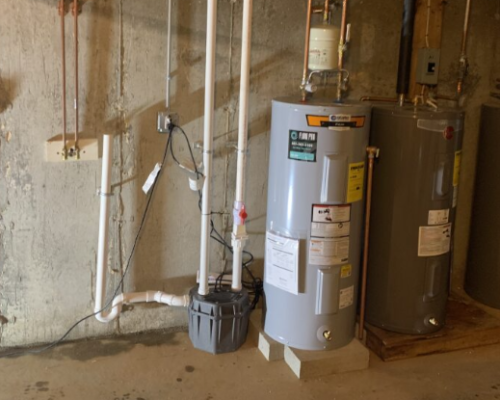 Hot water heater installation and plumbing system upgrade completed by Flow Pro Plumbing and Drain Cleaning, trusted plumber in Manchester, NH providing professional water heater services.